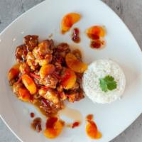Orange Chicken · DARK Meat battered , cooked in House sweet orange sauce and slices of madarinse