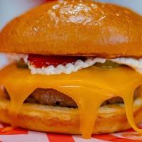 Cheeseburger · 1/3 Lb patty, cheedar cheese, pickles, ketchup and mustard.