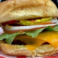 Salad Burger / X-Salada · 1/3 lb patty, cheddar cheese, ketchup, mustard, pickles, lettuce and tomatoes.