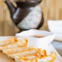 Gyoza (Ap) · Pan-fried pork dumpling.