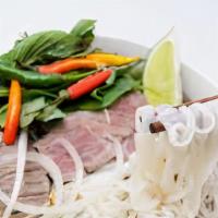 Pho A · Vietnamese style rice noodle with prime sliced beef in beef bone broth.