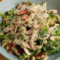 Chopped Rotisserie Chicken Salad · Mixed greens, avocado, bleu cheese, garbanzo, parmesan, green & red onions, Nueske’s smoked ...