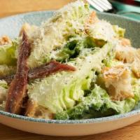 Bianca Caesar Salad · Little gem lettuce, parmesan, anchovy, croutons