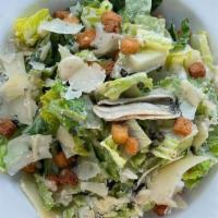 Caesar Salad · Romaine Lettuce, Shaved Parmesan, Croutons, Marinated Anchovies, 
Fried Capers, Caesar Dress...