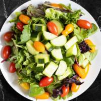 Fresh Garden Salad · Fresh iceberg lettuce, fresh cut tomatoes, carrots, and onions dressed tossed with lemon jui...