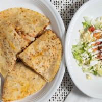 Quesadilla Ranchera · Quesadilla filled with cheese, onions, beans  and your choice of steak or grilled chicken.
s...