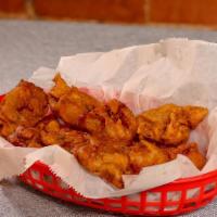 Pakora (5) · Vegan, gluten-free. Crispy assorted vegetables cooked in chickpea flour with choice of chutn...