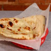 Naan (2) · plain or garlic. Oven-baked traditional Indian bread.
