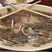 Pho Tai Chin · Rice noodle soup combined with beef brisket and round eye steak.