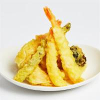 Shrimp Tempura · Shrimp and vegetables fried in tempura batter and served with a tempura dipping sauce.