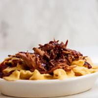 Piggy Mac · Mac and Cheese topped with BBQ Pulled Pork