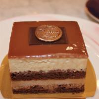 Coffee Mousse · Layers of flourless chocolate cake with delicious coffee cream mousse served w. Guatemalan r...