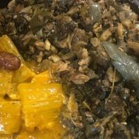 Callaloo And Cod Fish Dinner Platter · Much like Ackee, Callaloo is a green vegetable also sautéed along with salted cod chunks,  h...