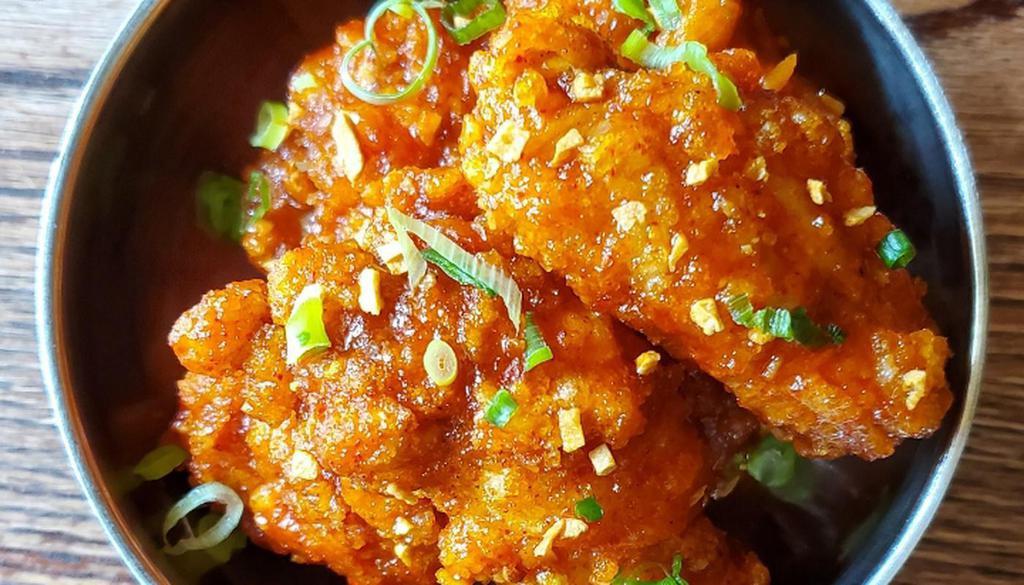 Korean Fried Chicken · Twice-fried chicken in a sweet and spicy soy glaze. Mix of drums and flats (5pcs).. Sauce will come on the side.