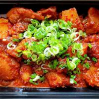 Dak Jjim · Chili-braised chicken thighs, potatoes, and onion