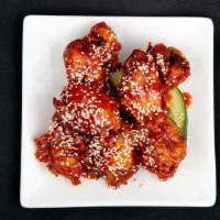 6 Pieces Chicken Wing With 1 Sauce · Crispy fried tossed with sauce of your choice and topped with toasted sesame seeds.