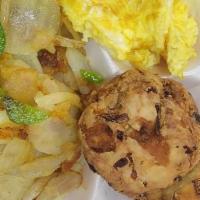  Crab Cake · 2eggs, toast and grits or home fries.