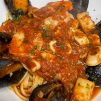 Linguine Frutti Di Mare · Mussels, shrimp, calamari, scallops in a white wine tomato sauce