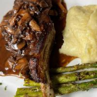 Veal Chop · 16 oz, mushrooms, rosemary, red wine demi glaze sauce, grilled asparagus and Parmesan mashed...
