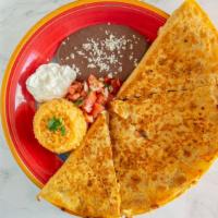 Chorizo Quesadilla · Flour tortilla stuffed with cheese and Mexican sausage only, served with rice, beans, sour c...