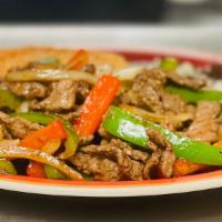 Res Fajita · Steak grilled with bell peppers and onions served with rice and beans