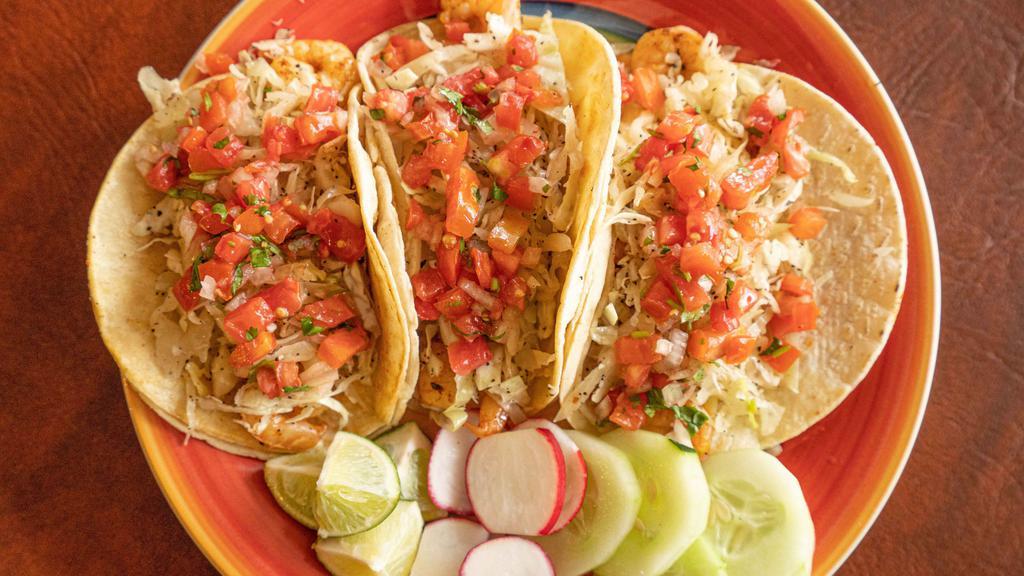 3 Shrimp Tacos · Soft corn tortilla with special chipotle sauce, grilled shrimp, pico de gallo, and cabbage.