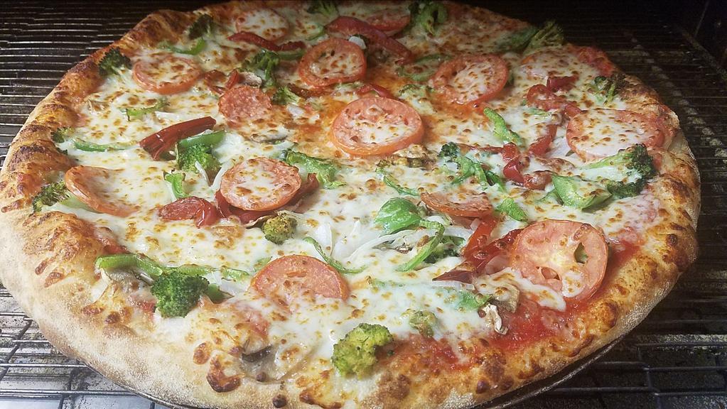 Veggie Feast Pizza · Fresh Slice Tomatoes ,Fresh Mushrooms, Fresh Green Pepper, Fresh Broccoli, Vidalia Onion, Romano Cheese and Mozzarella Cheese.