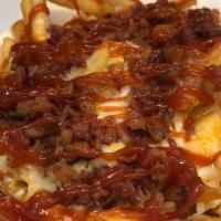 Bacon Cheesy Fries L · Thin-cut country fries, crispy bacon and cheese, topped with ketchup