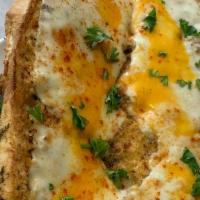Garlic Bread With Cheese · Buttery bread that is topped with garlic.