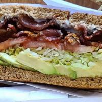 Avocado Blt Sandwich · Crispy applewood smoked bacon, avocado, lettuce, tomatoes and homemade tzatziki spread, on t...