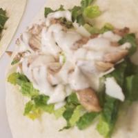 Chicken Caesar Wrap · Grilled Chicken, Romaine Heart Lettuce, Shaved Parmesan Cheese, House-made Croutons and Caes...