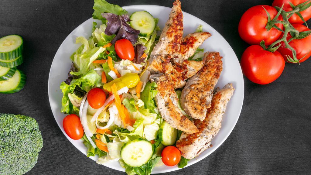 Chicken Kabob Salad · Base of Greek salad with grilled chicken.