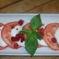 Caprese Insalata · tomatoes, fresh basil & mozzarella with side cranberry vinaigrette
