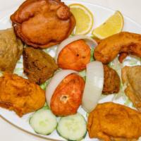 Assorted Appetizer Platter · a combination of samosas, sabzi bhajiyas, murgh tikka and boti kabob