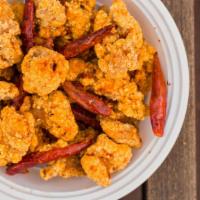 Dry Pepper Style · tossed with crispy dry peppers and dry blended spiced/chili oil