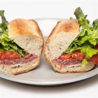 Cfs#12. Roast Beef Sandwich · Roast beef (rarish), lettuce, tomato and mayonnaise, on a freshly baked iggy's baguette; pla...