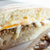 Classic Sausage Egg & Cheese · Classic sausage egg and cheese on an English muffin. Fresh Baked fornax English muffin, New ...