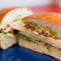Cfs#1. Turkey & Avocado Sandwich · Smoked turkey - nitrate free, new England smoked cheddar cheese, house-made red pepper relis...
