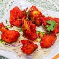 Gobi Manchurian (Dry) · Cauliflower stir-fried with a sweet and tangy Indo-Chinese sauce.