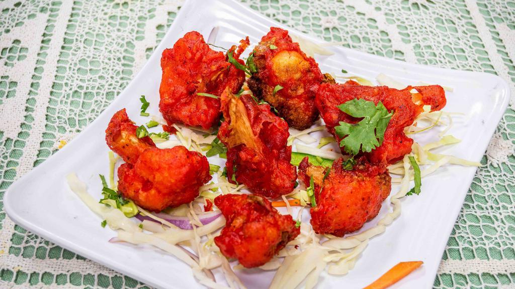 Gobi Manchurian (Dry) · Cauliflower stir-fried with a sweet and tangy Indo-Chinese sauce.