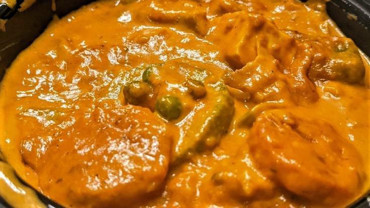 Navratna Korma · A royal entrée, nine vegetables cooked in a mild creamy sauce, sprinkled with dry nuts.