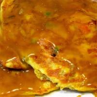 Chicken Egg Foo Young Combination With An Egg Roll · 