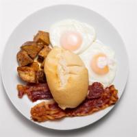 Supreme Breakfast · Two eggs (your way), home fries, and toast, choice of one meat: (ham, bacon or sausage).