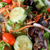 Tavola Salad · Field greens, cucumber, carrot, tomato, red onion, balsamic dressing