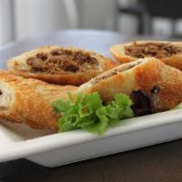 Cheesesteak Eggrolls · Scratch made with certified Angus beef and melted cooper sharp cheese, side of chipotle remo...