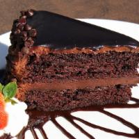 Triple Chocolate Cake (Slice) · Two incredibly rich and moist layers of chocolate cake topped with a creamy chocolate frosti...