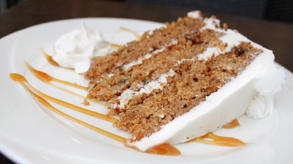 Carrot Cake (Slice) · Moist carrot cake sandwiched with our smooth cream cheese icing.