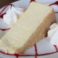 Cheesecake (Slice) · Rich, smooth cheesecake with a luscious and creamy filling in a homemade graham cracker crust.