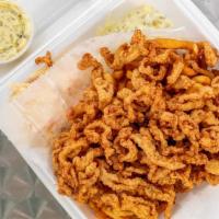 Clam Strips Dinner · Served with home made tartar sauce, homemade coleslaw and fried or rice.