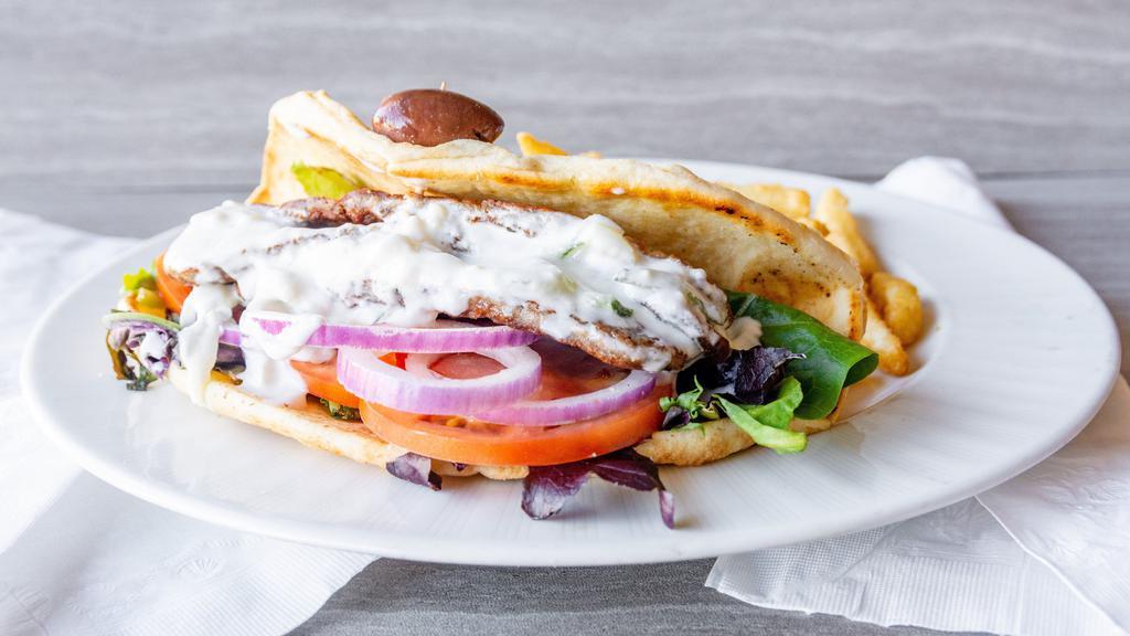 Lamb Gyro · lettuce,tomatoe,onions and tzatziki sauce in a pita served with salad or fries